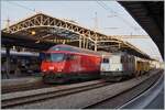 Die SBB Re 4/4 II 11344 (Re 420 344-4) und Re 460 027 in Lausanne.