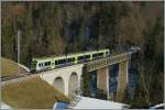 Ein  Lötschberger  auf dem Weg von Zweisimmen nach Bern befährt die Bunschenbachbrücke bei Weissenbach.