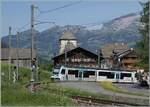 Der TPC ASD ABe 4/8 473 in der gef�lligen Glacier 3000 Gestaltung ist als Regionalzug von Les Diablerets auf dem Weg nach Aigle und hat soeben die Haltestelle Vers-l'Eglise verlassen und f�hrt nun am h�bschen Ort vorbei. 

31. Mai 2026